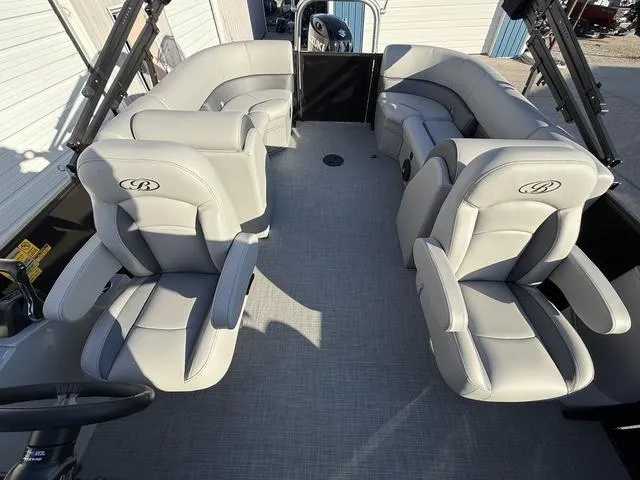 Slide: The Image of 2025 Bentley Pontoons Legacy 223 Navigator interior with luxurious seating. - 20
