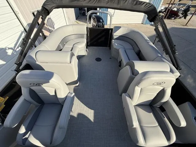 Slide: The Image of 2025 Bentley Pontoons Legacy 223 Navigator interior with luxurious seating and modern design. - 22
