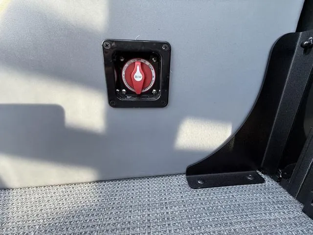 Slide: The Image of Battery switch on 2025 Bentley Pontoons Legacy 223 Navigator boat interior. - 24