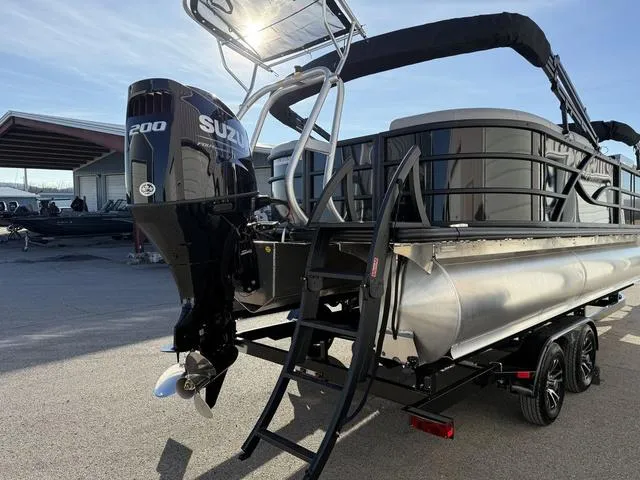 Slide: The Image of 2025 Bentley Pontoons Legacy 223 Navigator with Suzuki 200 outboard engine. - 5