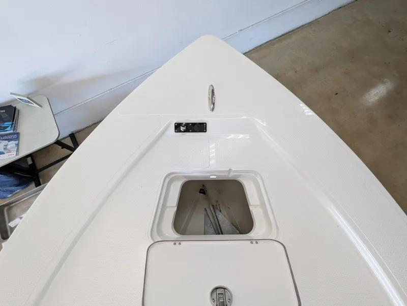 Slide: The Image of Bow of 2025 BlackJack 224 boat with anchor storage compartment. - 17