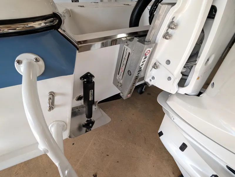 Slide: The Image of Interior view of a 2025 BlackJack 224 boat, showcasing mechanical components and fittings. - 24