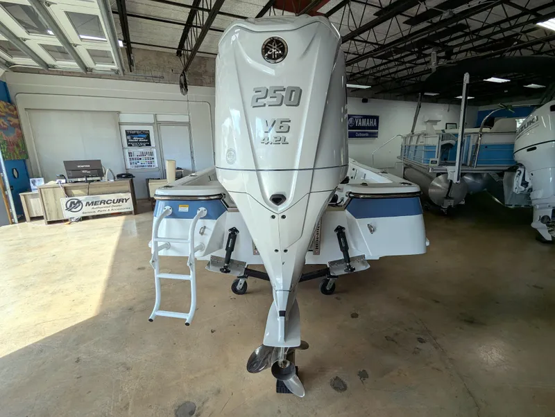 Slide: The Image of 2025 BlackJack 224 boat with 250 V6 outboard engine in showroom. - 25