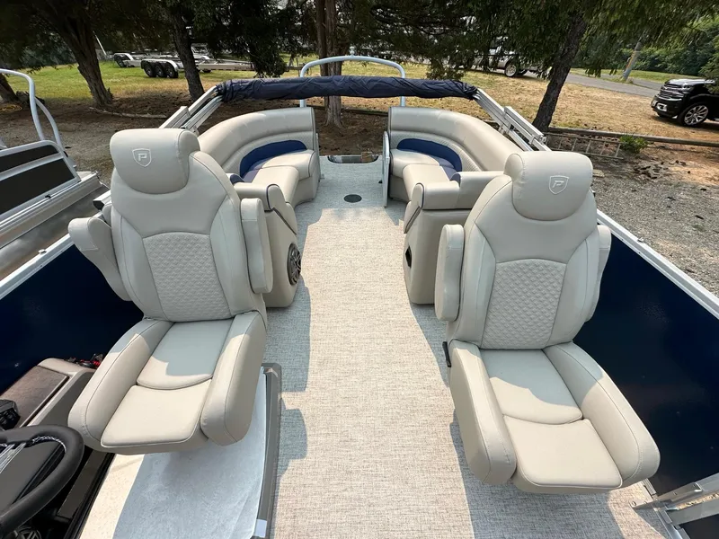 Slide: The Image of 2023 Premier 250 Solaris RF boat interior with luxurious seating and modern design. - 7