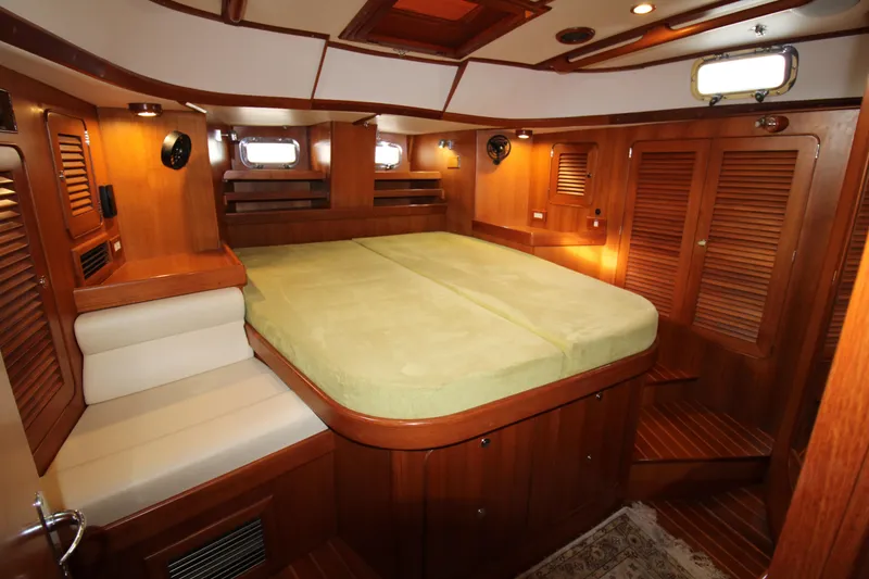 Slide: The Image of Luxurious cabin interior of 2006 Hylas 49 Center Cockpit yacht with wood finish. - 16