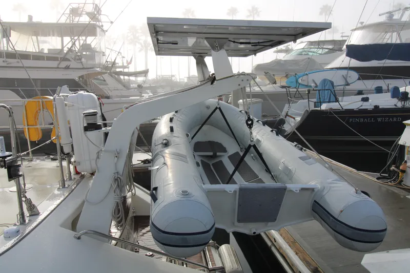 Slide: The Image of Inflatable dinghy on a 2006 Hylas 49 Center Cockpit yacht with solar panel. - 25