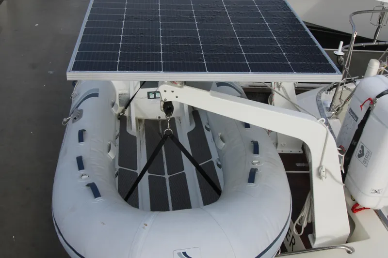 Slide: The Image of Inflatable boat under solar panel on 2006 Hylas 49 Center Cockpit yacht. - 3