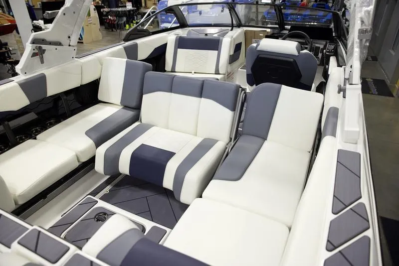 Slide: The Image of 2025 Malibu 23 LSV boat interior with luxurious seating and modern design. - 20