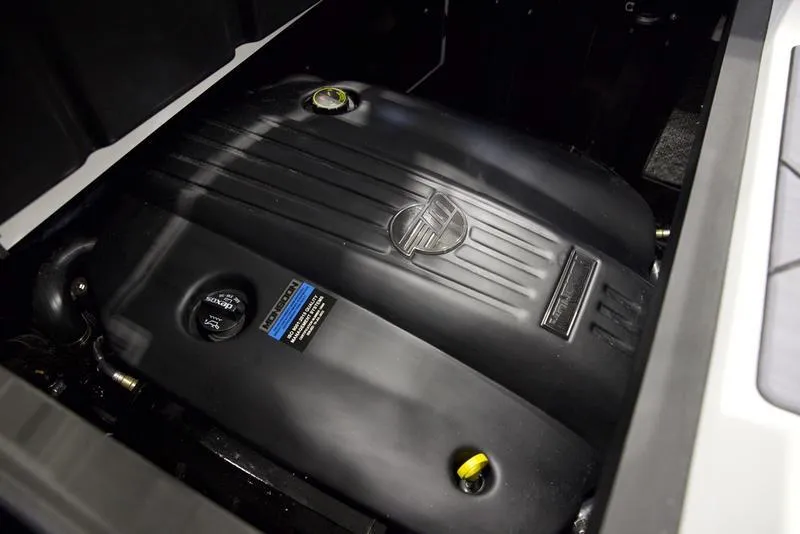 Slide: The Image of 2025 Malibu 23 LSV engine compartment, showcasing sleek black engine design. - 3