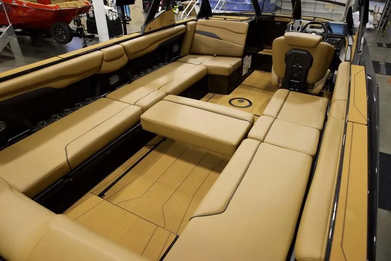 Slide: The Image of Luxurious interior of 2025 Axis T250 boat with tan leather seating. - 16