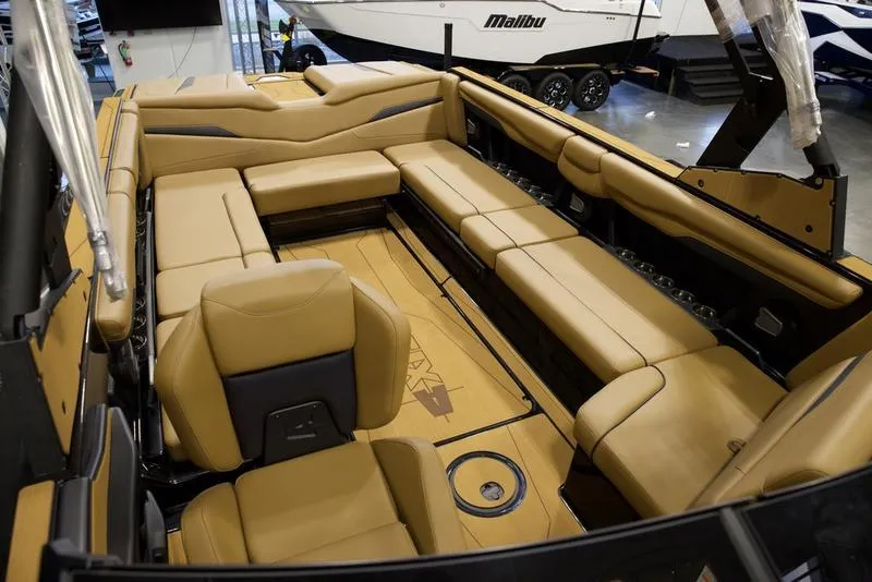 Slide: The Image of Luxurious interior of 2025 Axis T250 boat with tan seating and spacious layout. - 17