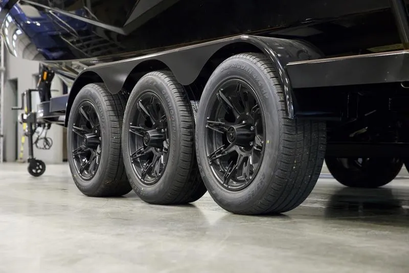 Slide: The Image of Triple axle trailer with black wheels for 2025 Axis T250 boat. - 4