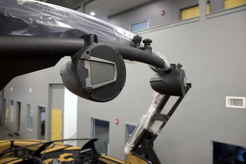 Slide: The Image of 2025 Axis T250 boat speaker system in a showroom setting. - 9