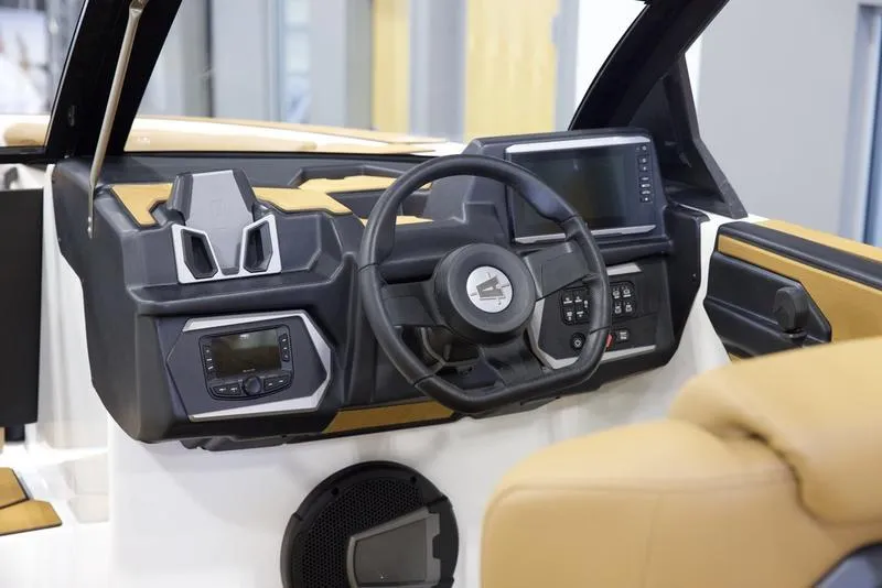 Slide: The Image of Interior dashboard of 2025 Axis T250 boat with modern controls and steering wheel. - 12