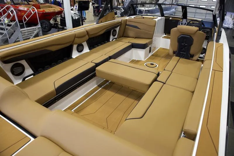 Slide: The Image of Luxurious interior of 2025 Axis T250 boat with tan seating and modern design. - 17