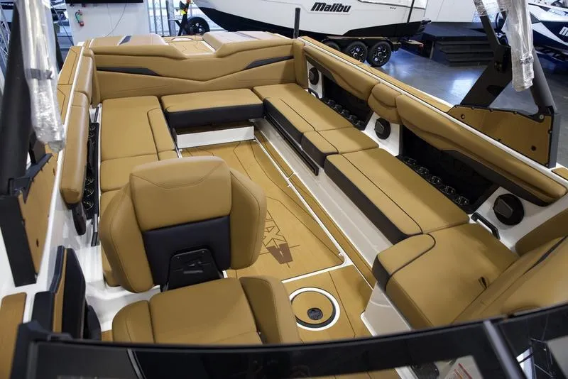 Slide: The Image of Luxurious interior of 2025 Axis T250 boat with tan seating and modern design. - 19