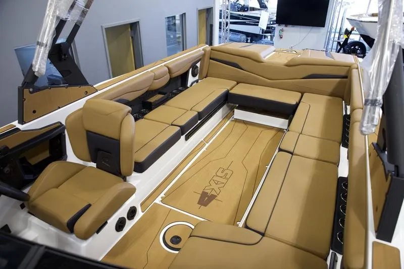 Slide: The Image of Luxurious interior of 2025 Axis T250 boat with tan seating and modern design. - 20