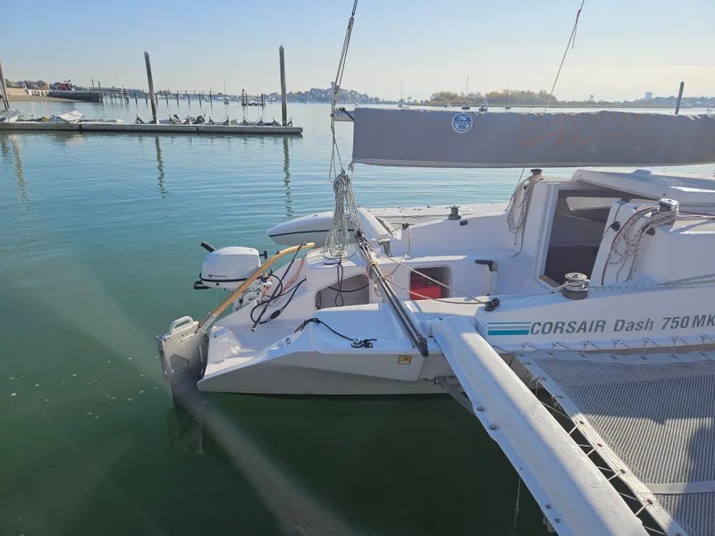 Slide: The Image of Corsair Dash 750 MKII sailboat docked in calm marina waters, 2013 model. - 4
