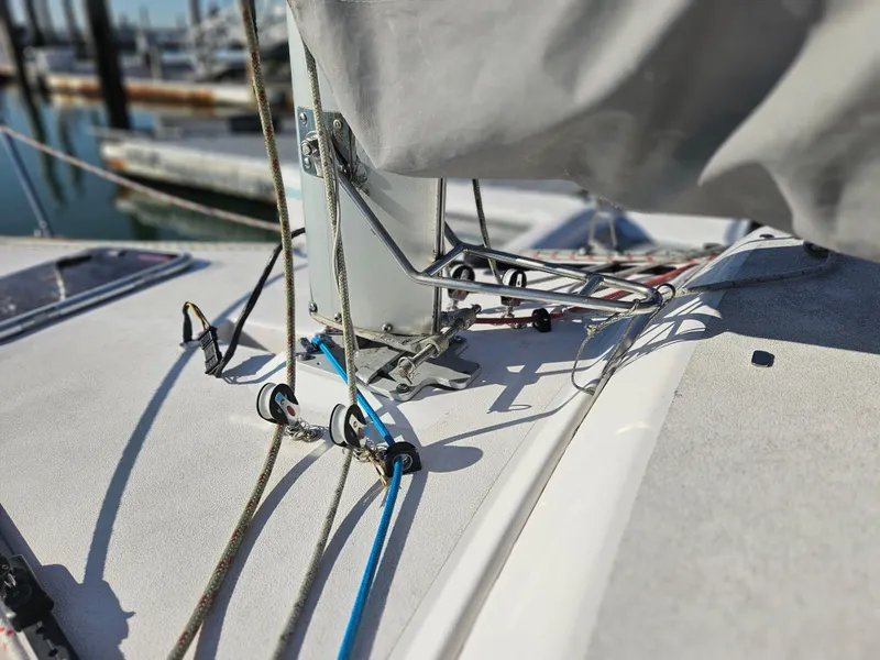 Slide: The Image of Close-up of Corsair Dash 750 MKII sailboat deck, featuring rigging and hardware, 2013 model. - 5