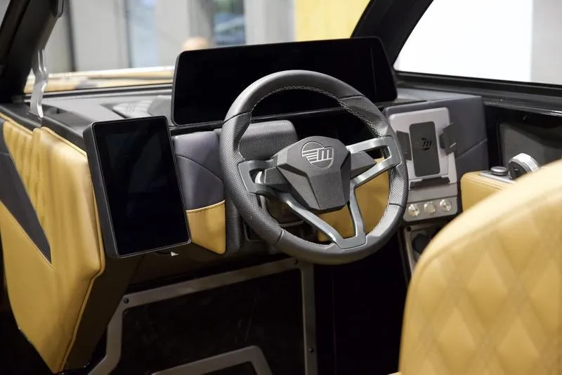 Slide: The Image of 2025 Malibu M230 interior with modern steering wheel and digital displays. - 16