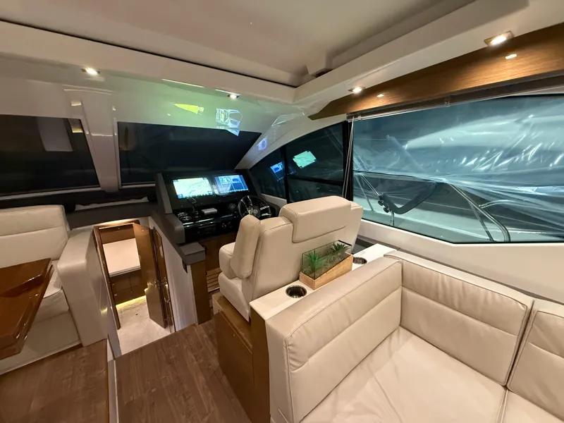 Slide: The Image of Luxurious interior of 2018 Cruisers Yachts 50 Cantius with modern helm and seating. - 1