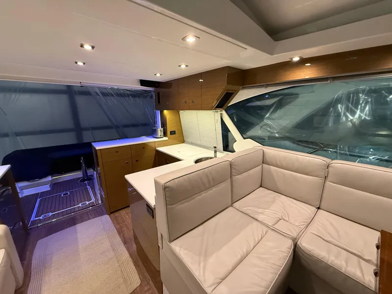 Slide: The Image of Luxurious interior of 2018 Cruisers Yachts 50 Cantius with modern seating and elegant design. - 10