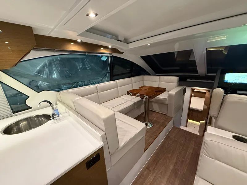 Slide: The Image of Luxurious interior of 2018 Cruisers Yachts 50 Cantius with plush seating and modern design. - 13