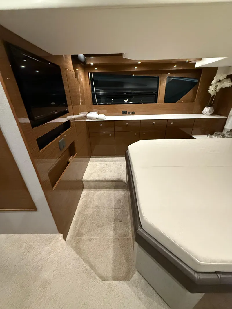 Slide: The Image of Luxurious interior of 2018 Cruisers Yachts 50 Cantius with modern furnishings and elegant design. - 17