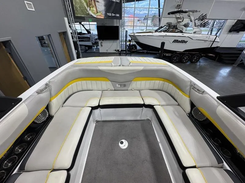 Slide: The Image of 2013 Malibu Wakesetter 24 MXZ interior with spacious seating and modern design. - 14