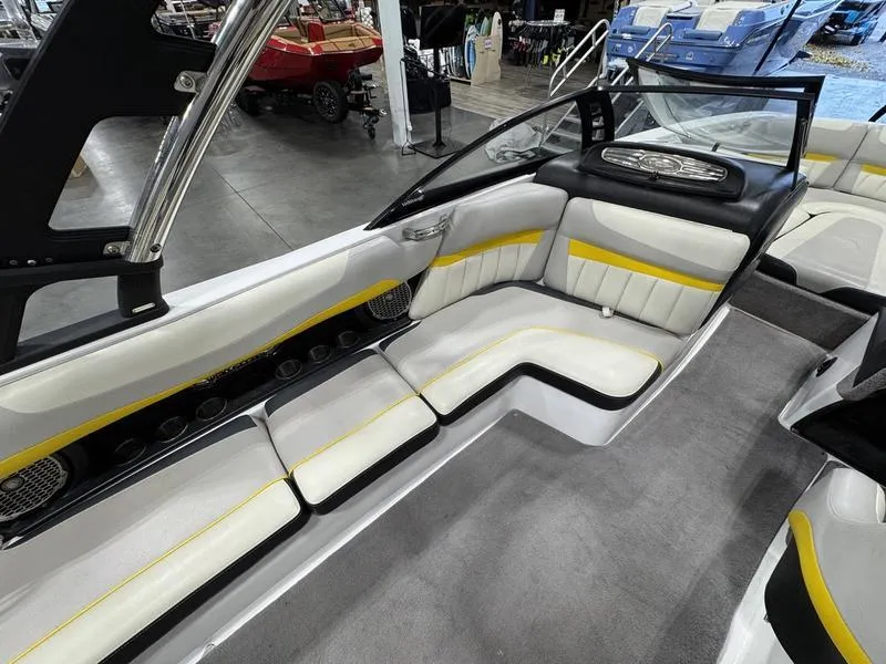 Slide: The Image of Interior of 2013 Malibu Wakesetter 24 MXZ boat with sleek seating and modern design. - 4