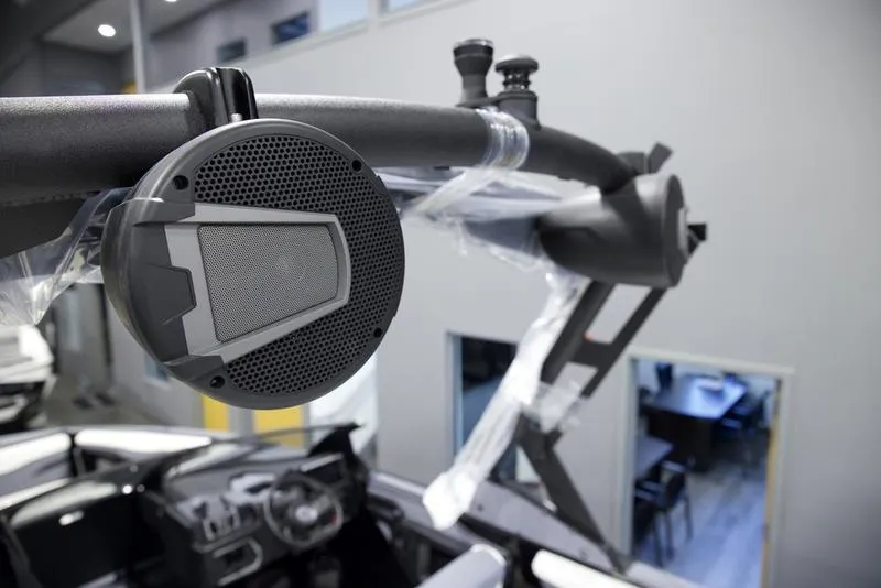 Slide: The Image of Close-up of a 2025 Axis T220 boat speaker system in a showroom. - 10