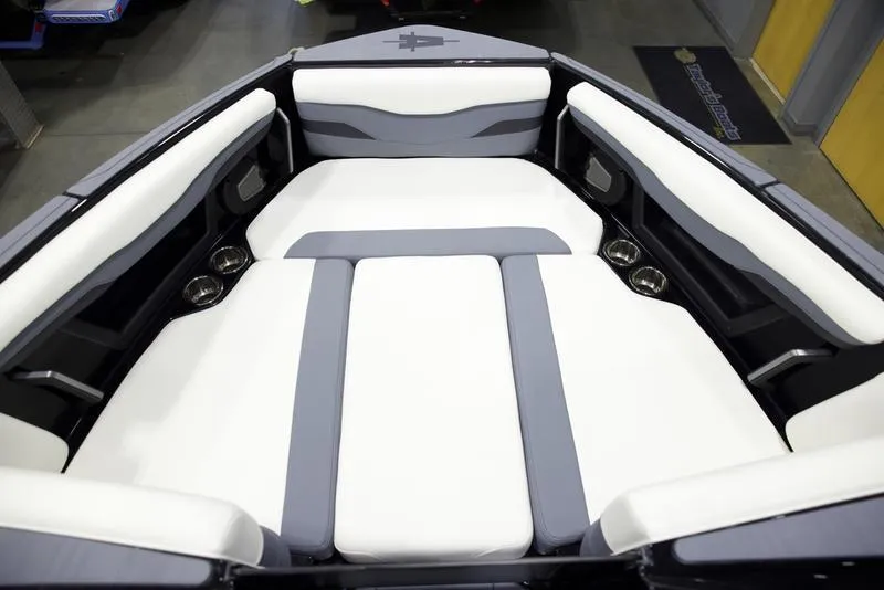 Slide: The Image of 2025 Axis T220 boat interior with white and gray seating. - 15