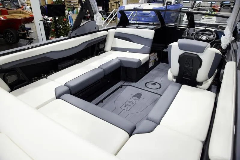 Slide: The Image of Luxurious interior of 2025 Axis T220 boat with modern seating and sleek design. - 16