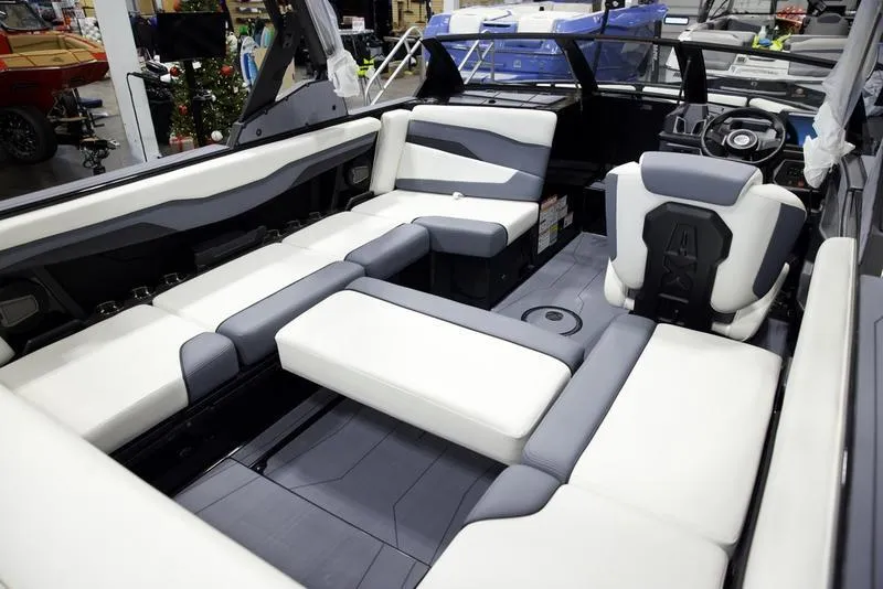 Slide: The Image of 2025 Axis T220 boat interior with modern seating and sleek design. - 18