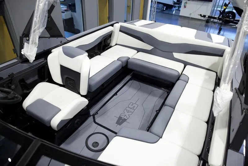 Slide: The Image of Luxurious interior of 2025 Axis T220 boat with spacious seating and modern design. - 19
