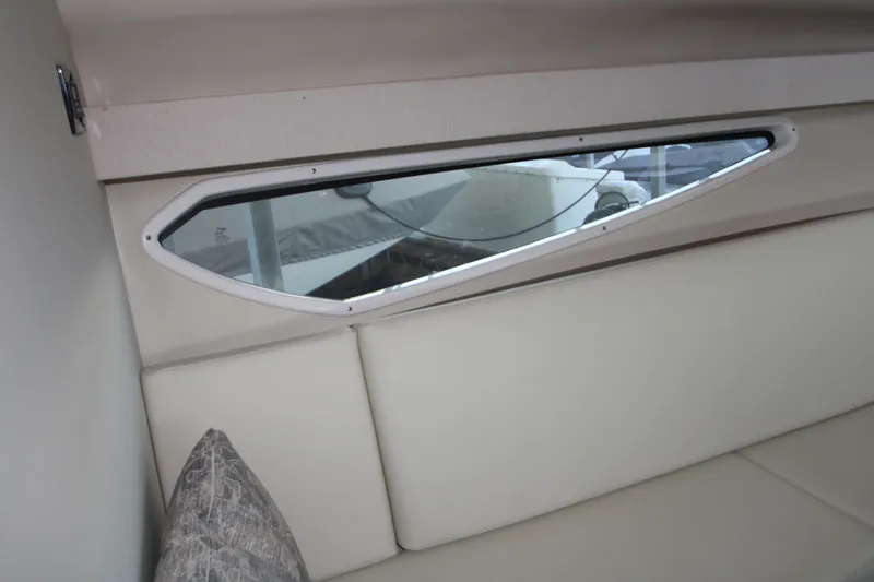 Slide: The Image of Interior view of 2022 Regal 28 Express boat with sleek window design. - 31