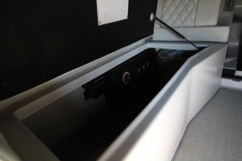 Slide: The Image of Interior view of 2022 Regal 28 Express boat storage compartment. - 43