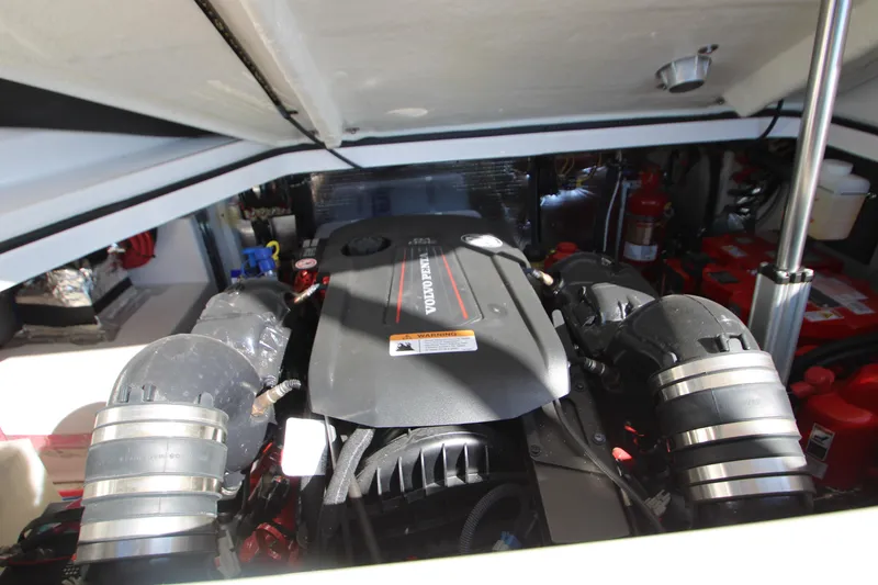 Slide: The Image of Engine compartment of 2022 Regal 28 Express boat, showcasing Volvo Penta engine. - 46