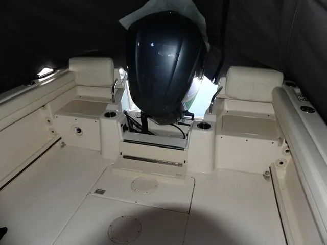 Slide: The Image of 2022 Grady-White Adventure 208 boat interior with outboard motor. - 19