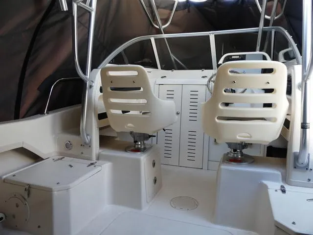 Slide: The Image of Interior of 2022 Grady-White Adventure 208 boat with dual helm seats. - 21