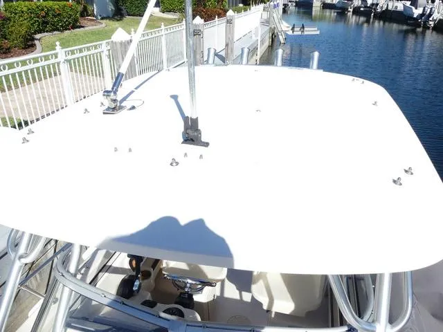 Slide: The Image of 2022 Grady-White Adventure 208 boat top view at dockside. - 28