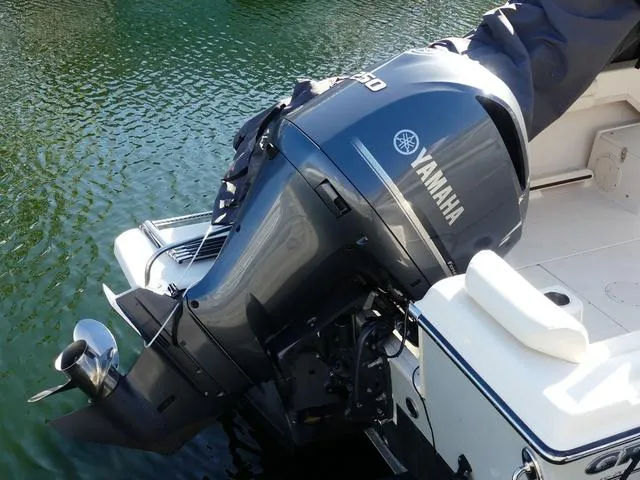 Slide: The Image of 2022 Grady-White Adventure 208 with Yamaha outboard motor on water. - 5