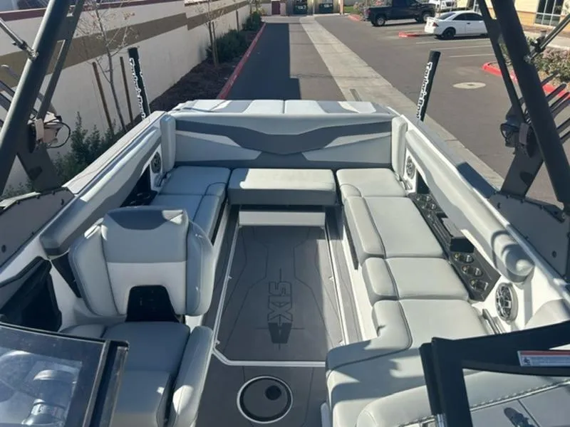 Slide: The Image of 2023 Axis T235 boat interior with spacious seating and modern design. - 18