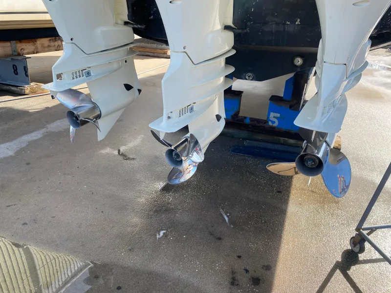 Slide: The Image of Twin outboard motors on a 2000 Donzi 35 ZF Open boat. - 10