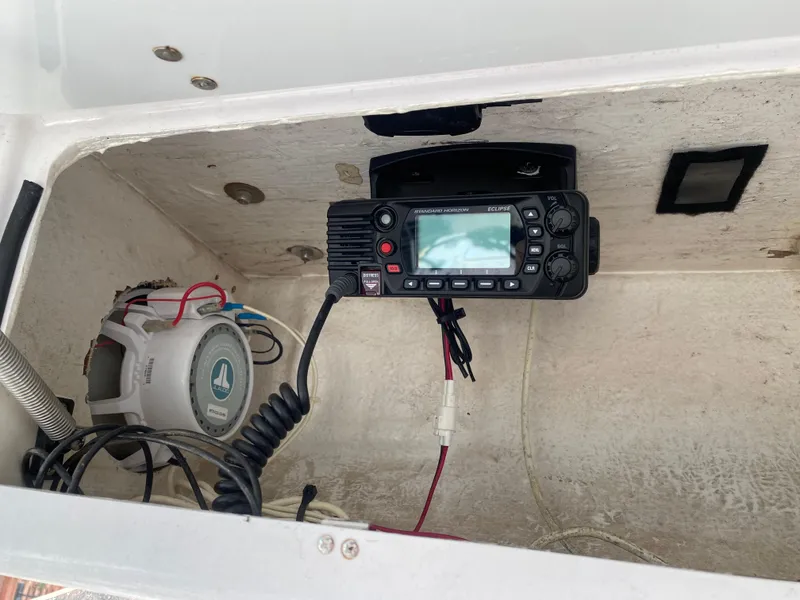 Slide: The Image of Boat electronics compartment with radio and speaker on a 2000 Donzi 35 ZF Open. - 20
