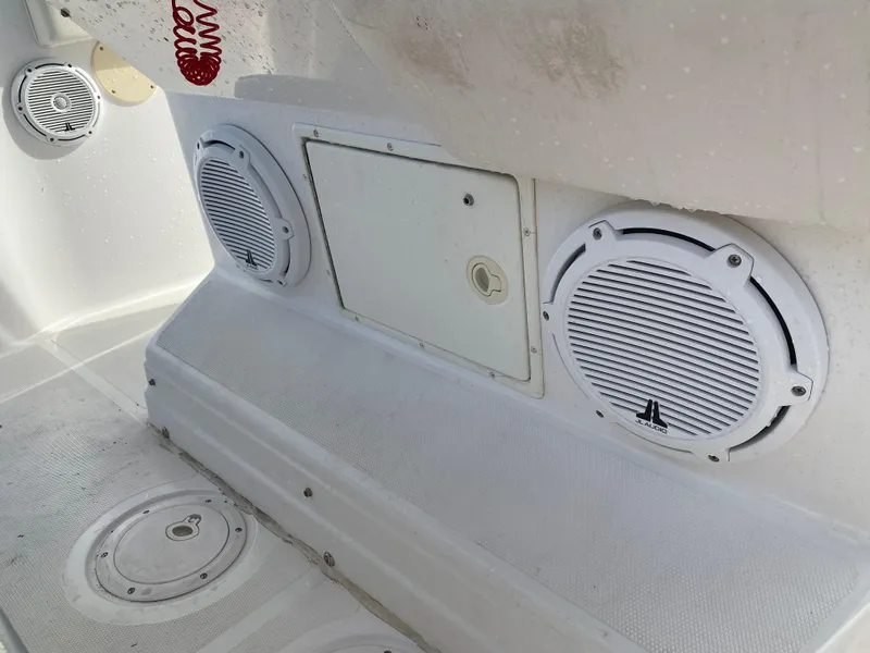 Slide: The Image of White Donzi 35 ZF Open boat interior with speakers, 2000 model. - 22