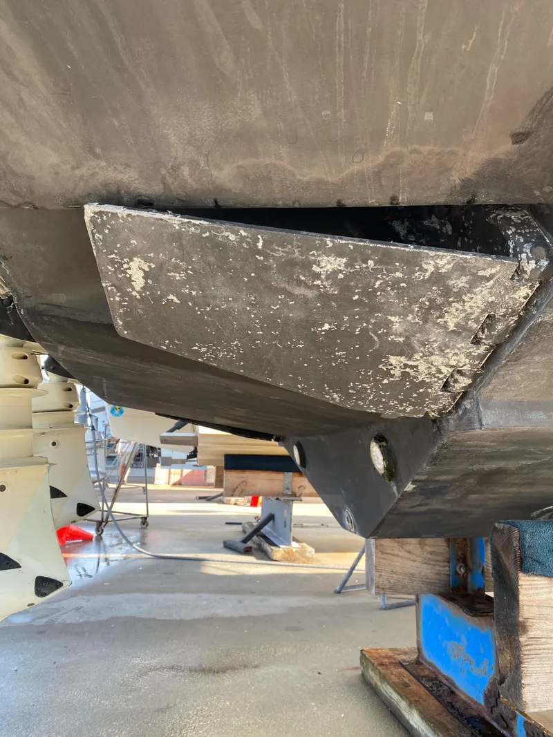 Slide: The Image of Close-up of 2000 Donzi 35 ZF Open boat hull in dry dock. - 24