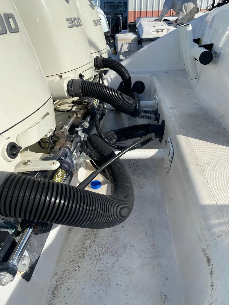 Slide: The Image of Close-up of 2000 Donzi 35 ZF Open boat engines and hoses. - 25