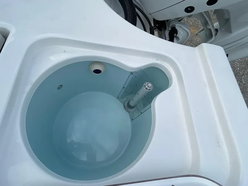 Slide: The Image of Seapro 230 boat livewell, 2025 model, featuring a clean, white design. - 10