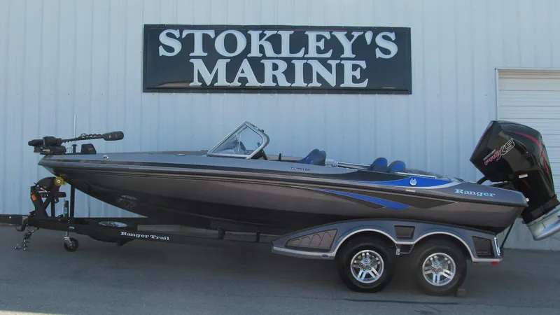Slide: The Image of 2025 Ranger 212LS boat at Stokley's Marine dealership. - 1